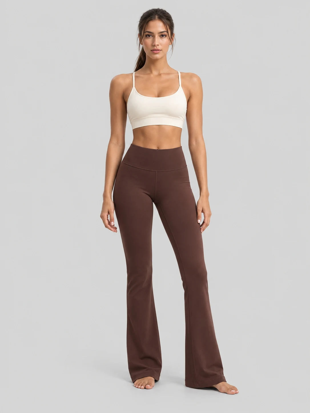 Avensai cream sports bra and brown flared leggings, front view