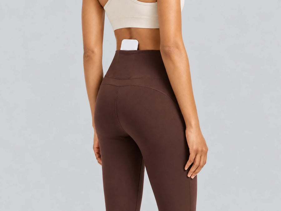 Back waistband pocket detail on Avensai brown leggings